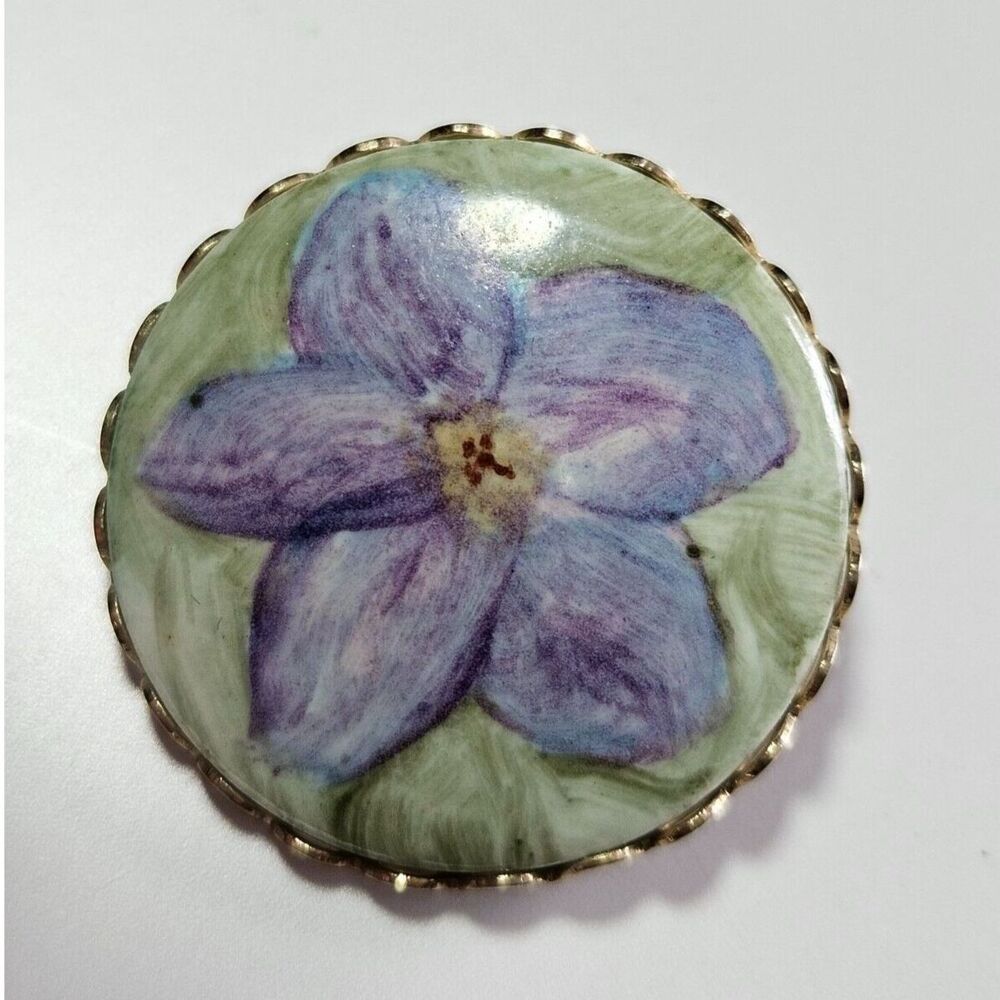 Gold tone blue flower brooch green round vintage